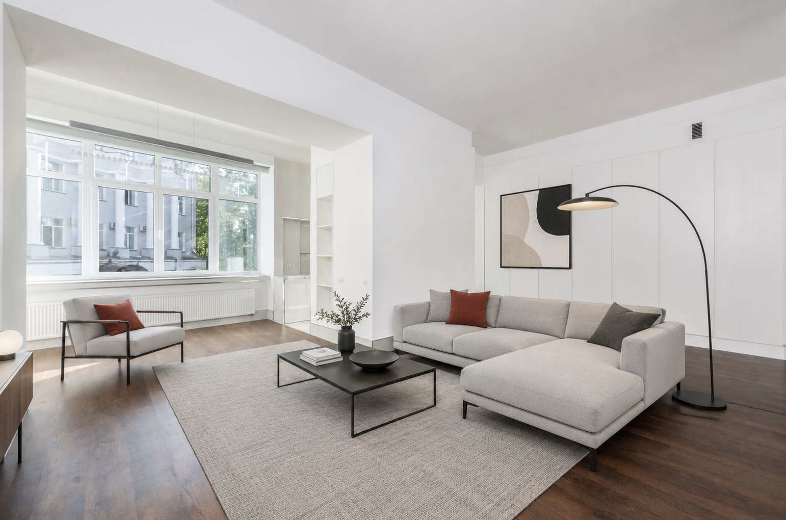 Living room virtually staged with light, modern furniture